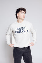 Man wearing 'Malone University' crew against gray background.